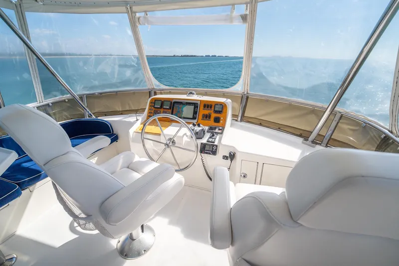 Slide: The Image of Helm of 2007 Ocean Alexander 52 Sedan yacht with ocean view. - 15