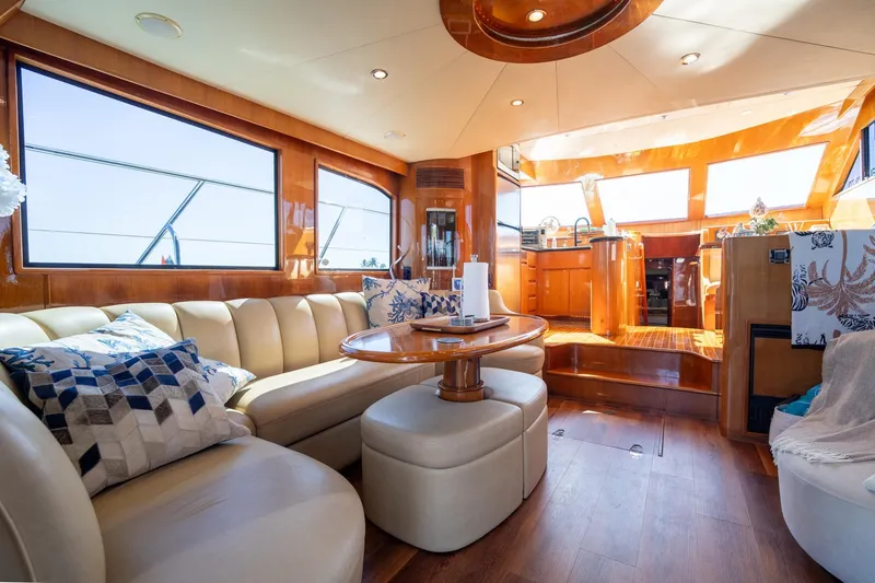 Slide: The Image of Luxurious interior of 2007 Ocean Alexander 52 Sedan yacht with elegant seating and wood finishes. - 20