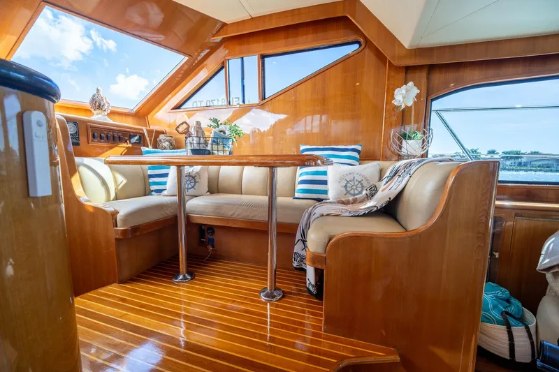 Slide: The Image of Luxurious interior of 2007 Ocean Alexander 52 Sedan yacht with elegant wood finish. - 23