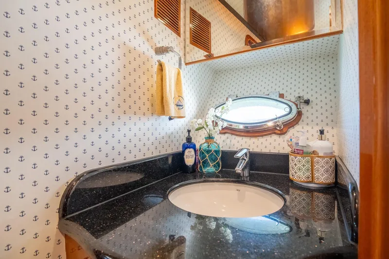 Slide: The Image of Luxurious bathroom in 2007 Ocean Alexander 52 Sedan yacht with nautical decor. - 31