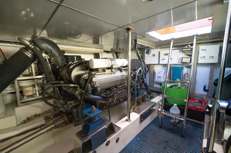 Slide: The Image of Engine room of 2007 Ocean Alexander 52 Sedan yacht, featuring machinery and equipment. - 33