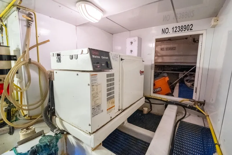 Slide: The Image of Engine room of 2007 Ocean Alexander 52 Sedan with Onan Marine Genset. - 34