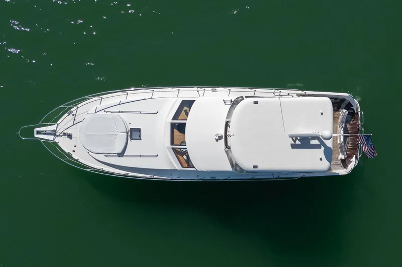 Slide: The Image of Aerial view of 2007 Ocean Alexander 52 Sedan yacht on green water. - 8