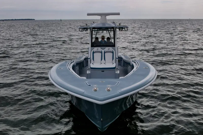 Slide: The Image of 2025 Yellowfin 36 Offshore boat on open water, front view. - 3