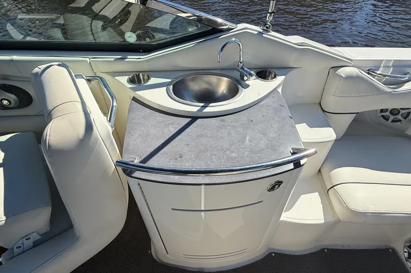 Slide: The Image of Close-up of a 2006 Sea Ray 270 SLX boat stereo control panel. - 20