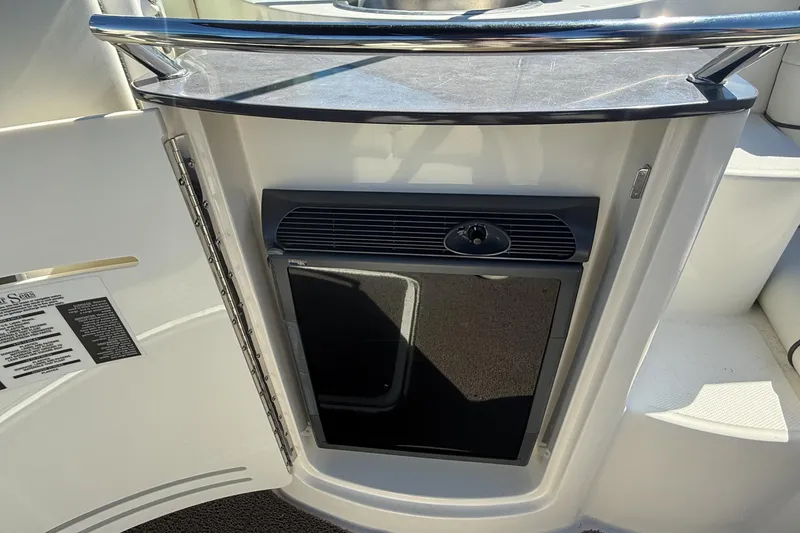 Slide: The Image of Interior view of 2006 Sea Ray 270 SLX boat bathroom with toilet. - 21