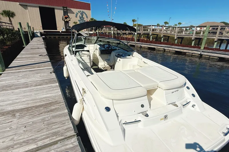 Slide: The Image of 2006 Sea Ray 270 SLX boat interior with open cockpit and water view. - 28