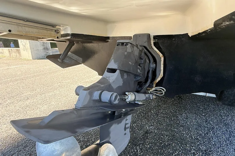 Slide: The Image of 2006 Sea Ray 270 SLX boat on trailer under bridge, side view. - 9