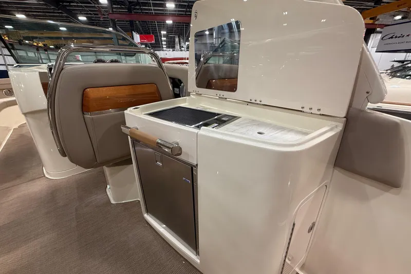 Slide: The Image of 2026 Chris-Craft Launch 35 GT interior with sleek kitchenette and modern design. - 12