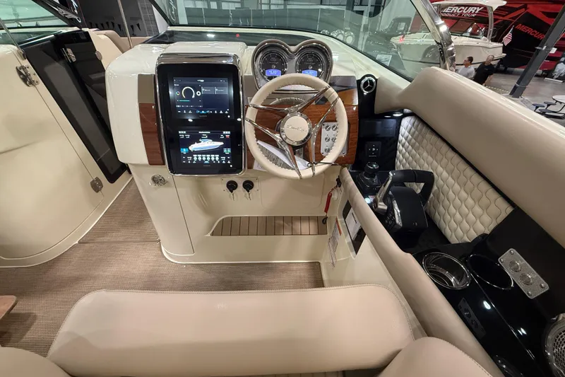Slide: The Image of 2026 Chris-Craft Launch 35 GT cockpit with modern controls and luxurious interior design. - 14