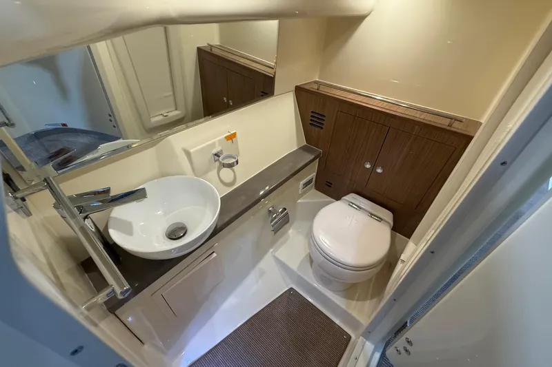 Slide: The Image of Luxurious bathroom in 2026 Chris-Craft Launch 35 GT boat, featuring modern sink and toilet. - 24