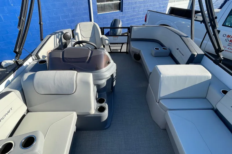 Slide: The Image of 2026 Starcraft GX 16 R boat interior with spacious seating and cup holders. - 4