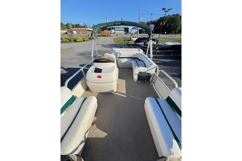 Slide: The Image of 2010 Sun Tracker Party Barge 20 Classic Series pontoon boat with spacious seating and canopy. - 7