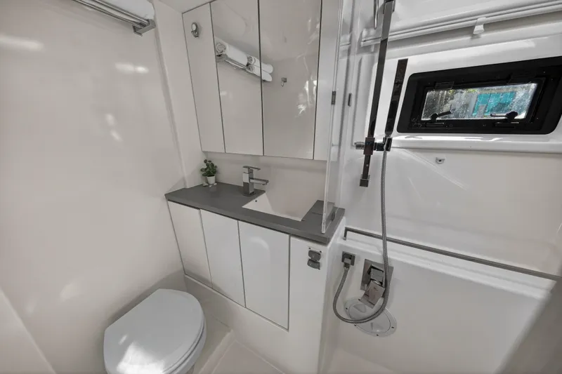 Slide: The Image of Modern bathroom in a 2019 Leopard 45 yacht, featuring sleek fixtures and a compact design. - 107