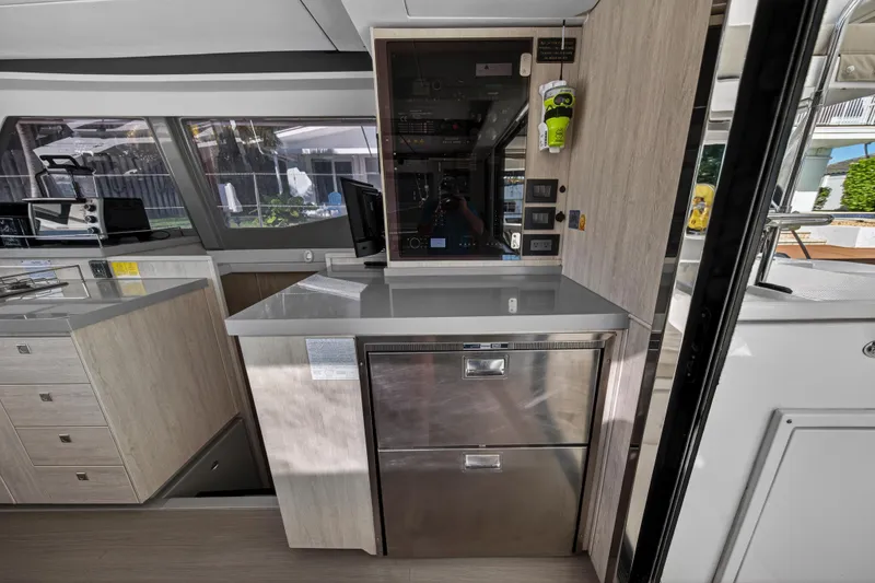 Slide: The Image of Modern kitchen interior of 2019 Leopard 45 yacht with sleek cabinetry and appliances. - 19