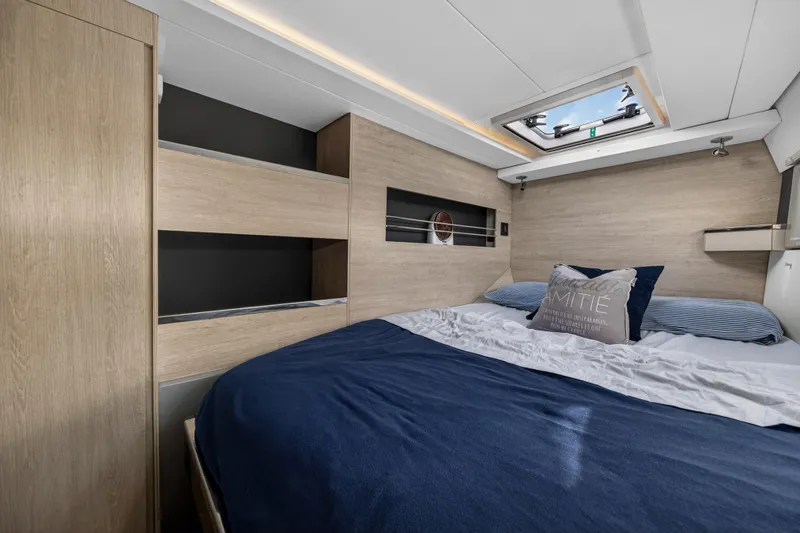 Slide: The Image of Luxurious bedroom interior of 2019 Leopard 45 yacht with skylight and modern design. - 21