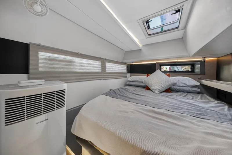 Slide: The Image of Luxurious cabin interior of 2019 Leopard 45 yacht with cozy bedding and modern design. - 22