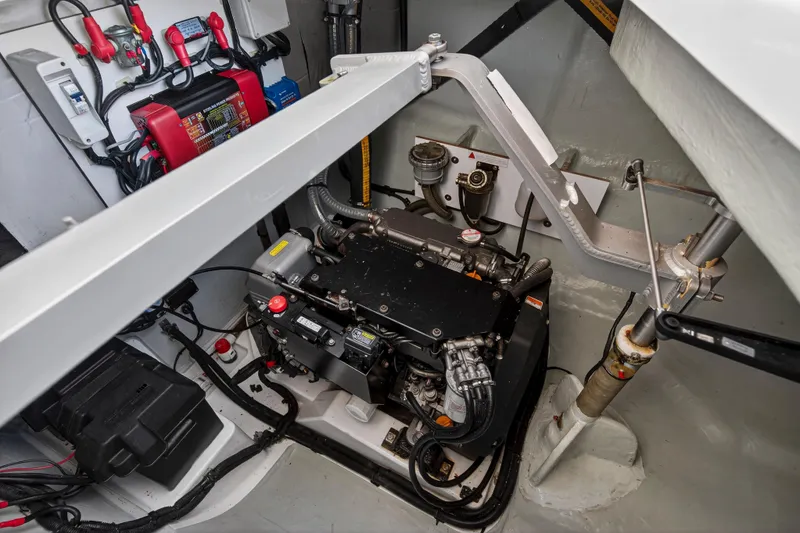 Slide: The Image of Engine room of a 2019 Leopard 45 catamaran, showcasing mechanical components and wiring. - 43
