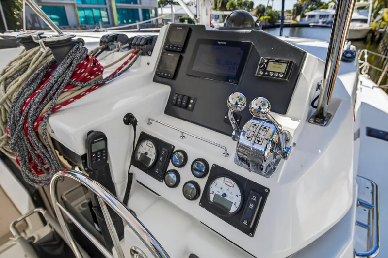 Slide: The Image of Control panel of a 2019 Leopard 45 yacht with navigation instruments and ropes. - 50