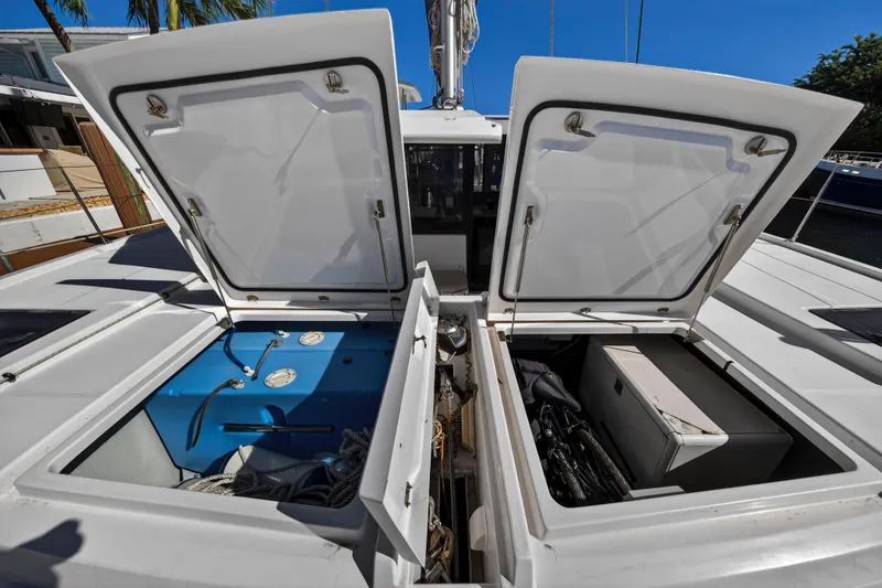 Slide: The Image of Open storage compartments on a 2019 Leopard 45 catamaran deck. - 56