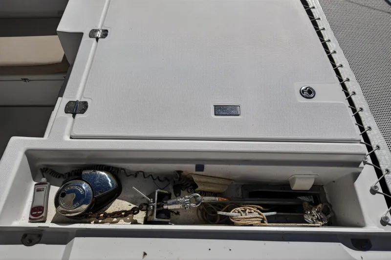 Slide: The Image of Anchor locker of a 2019 Leopard 45 catamaran with winch and chain storage. - 59