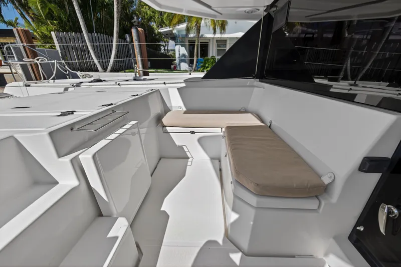 Slide: The Image of 2019 Leopard 45 yacht interior with cushioned seating and sleek design. - 62