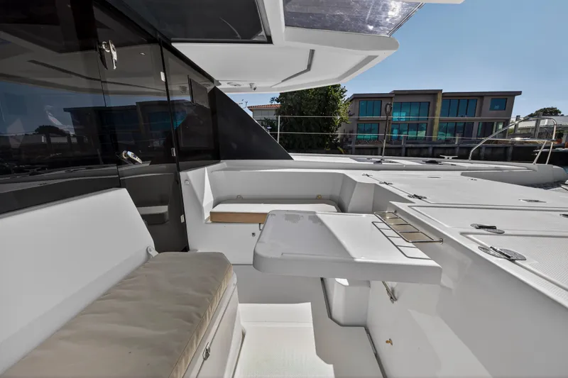 Slide: The Image of 2019 Leopard 45 yacht interior with seating and table, modern design. - 65
