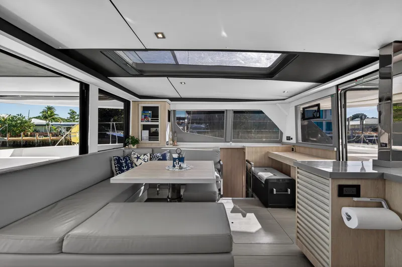 Slide: The Image of Luxurious interior of a 2019 Leopard 45 yacht with modern seating and large windows. - 72