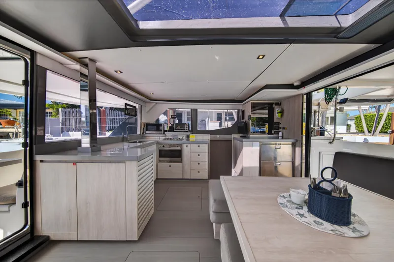 Slide: The Image of Luxurious interior of 2019 Leopard 45 yacht with modern kitchen and dining area. - 73
