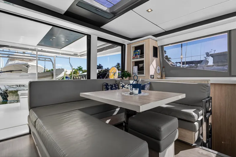 Slide: The Image of Luxurious interior of 2019 Leopard 45 yacht with modern seating and large windows. - 76
