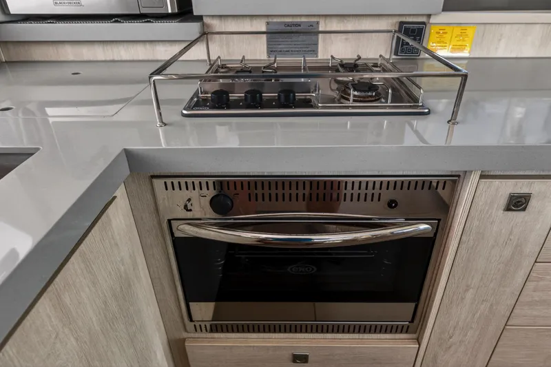 Slide: The Image of Modern kitchen in 2019 Leopard 45 yacht with stove and oven. - 82