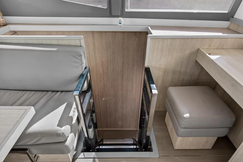 Slide: The Image of Interior of 2019 Leopard 45 yacht with modern seating and wooden finishes. - 88