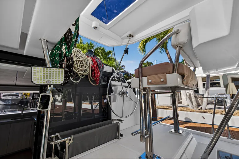 Slide: The Image of Interior view of 2019 Leopard 45 catamaran helm with ropes and seating. - 9
