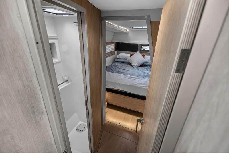 Slide: The Image of Interior of 2019 Leopard 45 yacht showing bedroom and bathroom. - 93