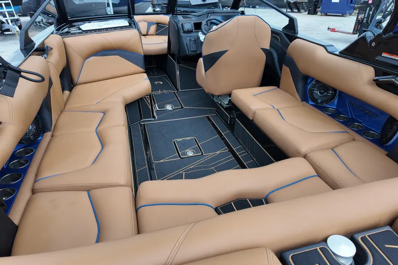 Slide: The Image of Luxurious interior of 2025 Centurion Fe23 boat with tan leather seating and modern design. - 9