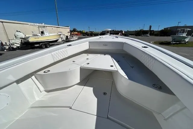 Slide: The Image of 2026 Pair Customs 24 Center Console DV Offshore boat, spacious deck, sleek design. - 10