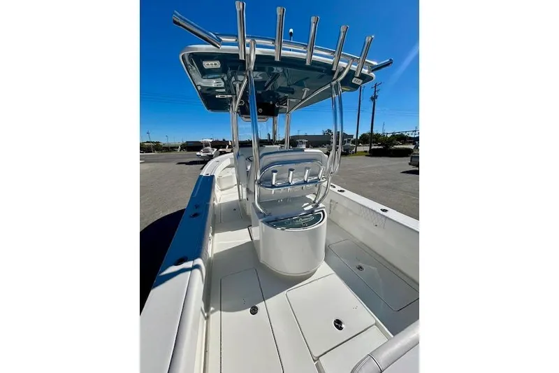Slide: The Image of 2026 Pair Customs 24 Center Console DV Offshore boat, sleek design, sunny day. - 20