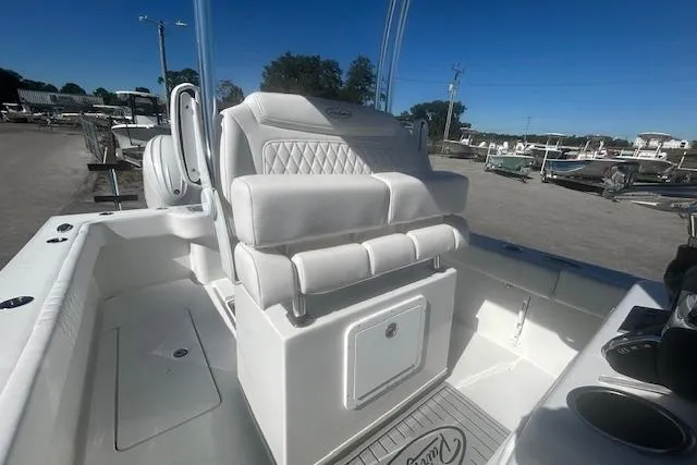Slide: The Image of 2026 Pair Customs 24 Center Console DV Offshore boat with luxurious seating and sleek design. - 6