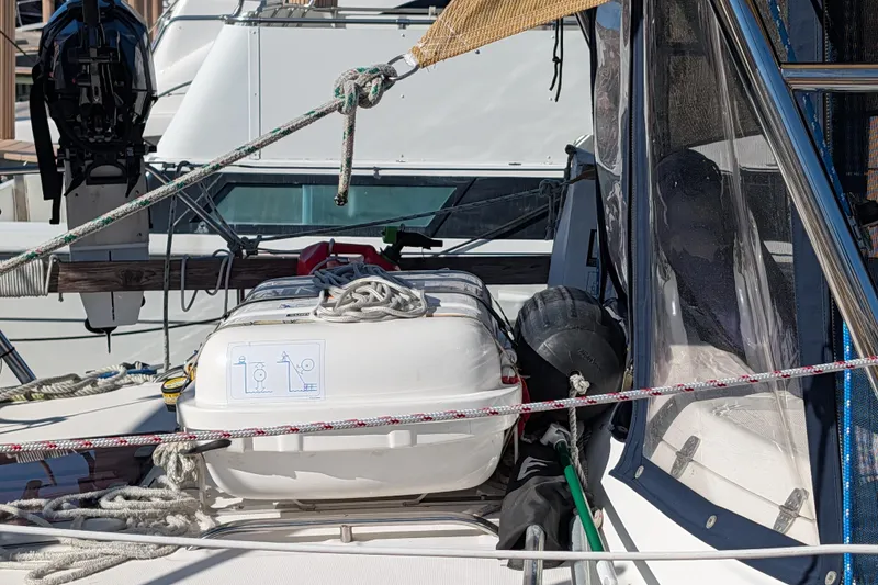 Slide: The Image of Hunter 450 Passage 2002 sailboat deck with liferaft and ropes. - 14