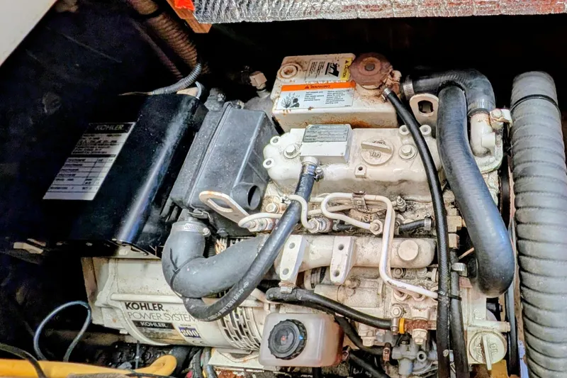 Slide: The Image of Engine compartment of a 2002 Hunter 450 Passage sailboat with Kohler power system. - 43