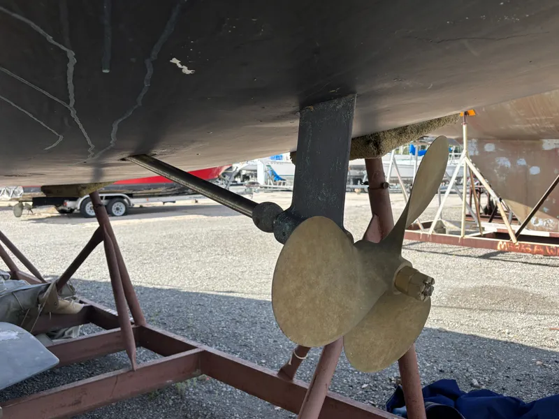 Slide: The Image of Propeller and rudder of a 2000 Catalina 380 sailboat on a stand. - 11