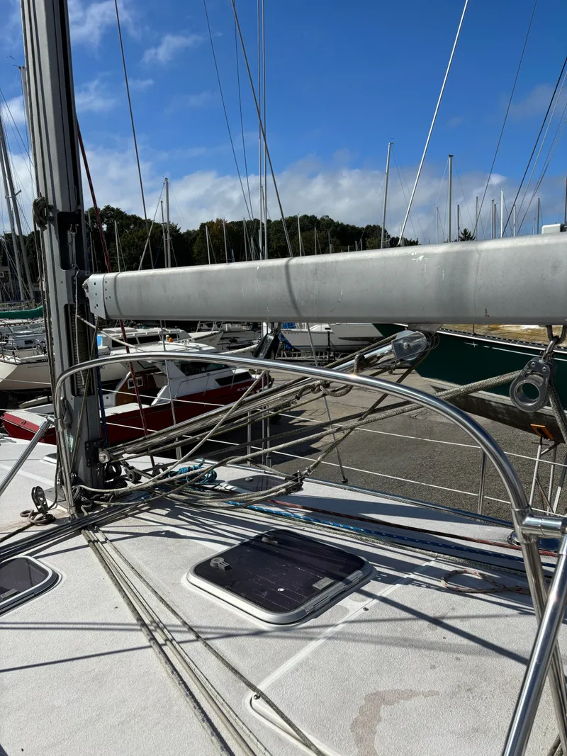Slide: The Image of Sailboat deck of 2000 Catalina 380 with rigging and clear blue sky. - 19