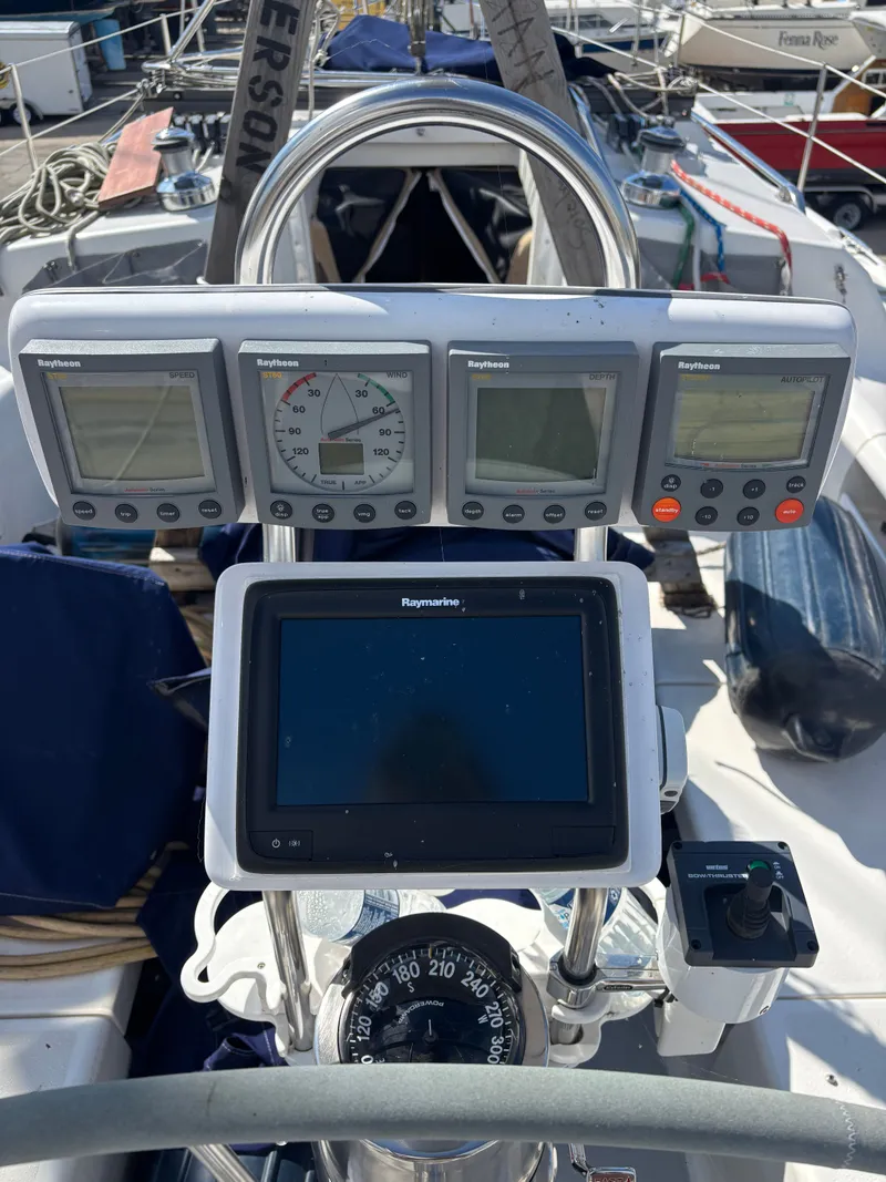Slide: The Image of Cockpit of 2000 Catalina 380 sailboat with Raytheon navigation instruments and compass. - 26