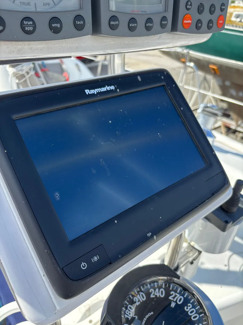 Slide: The Image of Raymarine navigation display on a 2000 Catalina 380 sailboat cockpit. - 31