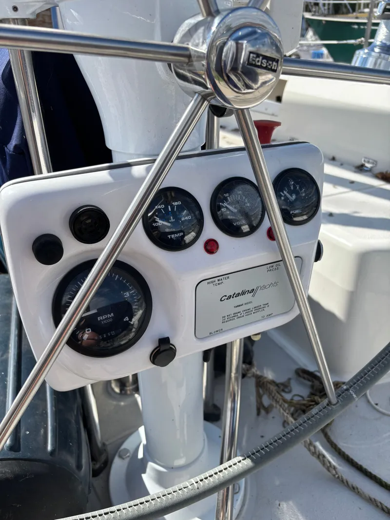 Slide: The Image of Steering wheel and instrument panel of a 2000 Catalina 380 sailboat. - 34