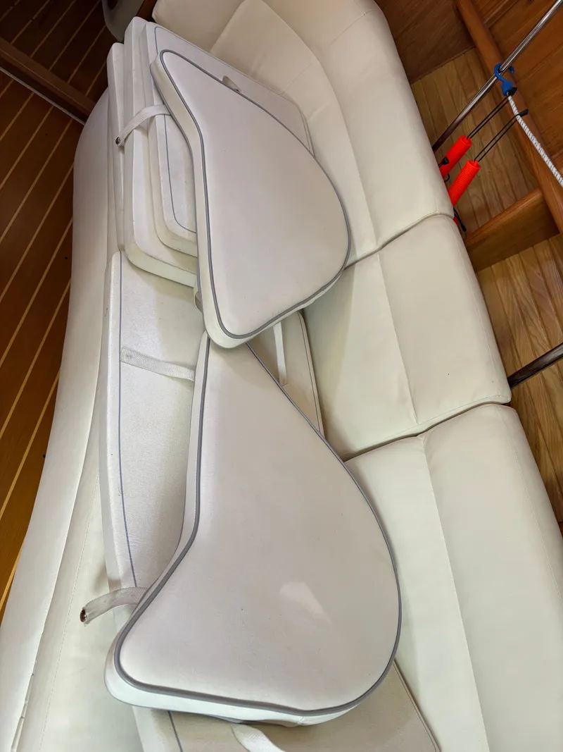 Slide: The Image of Cushions on a Catalina 380 sailboat's interior seating, showcasing white upholstery. - 44