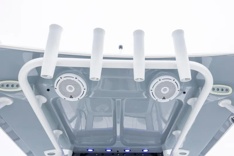 Slide: The Image of 2021 Sea Hunt Gamefish 25 boat roof with rod holders and speakers. - 25