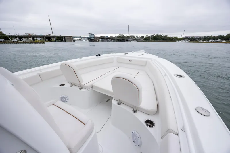 Slide: The Image of 2021 Sea Hunt Gamefish 25 boat with spacious seating on calm waters. - 27