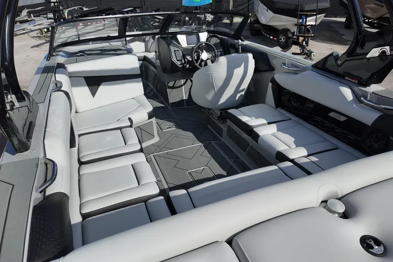 Slide: The Image of Luxurious interior of 2025 Supreme S220 boat with modern seating and sleek design. - 12