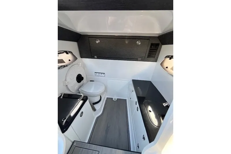 Slide: The Image of 2026 Monterey Elite 27 SD boat interior with modern bathroom amenities. - 15